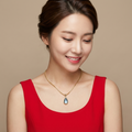Oceanic Tear Pendant Necklace – Gold Stainless Steel & Blue Cat's Eye Stone